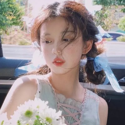 桃花含露又春风